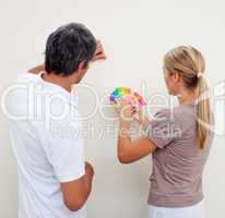 Couple paint a room