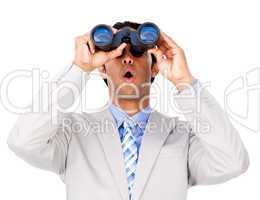 businessman looking through binoculars