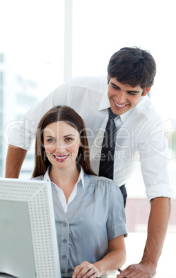 Co-workers at a computer