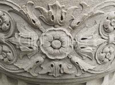 Floral pattern carved into stone