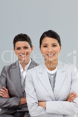 businesswomen with folded arms