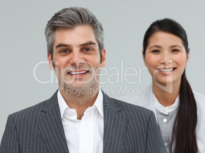 Businessman and businesswoman in a line