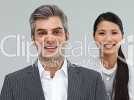 Businessman and businesswoman in a line