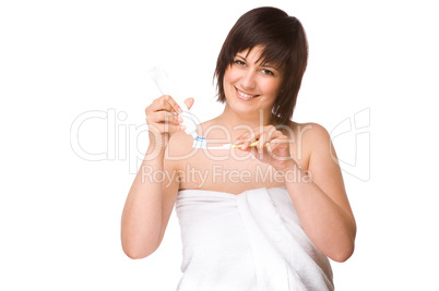 Junge Frau mit einer Zahnbürste