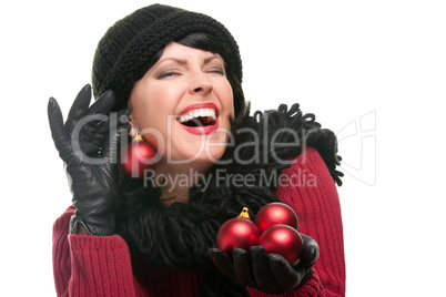 Playful Woman Holding Christmas Ornaments