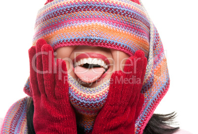Playful Woman With Colorful Scarf Over Eyes Sticking Out Tong