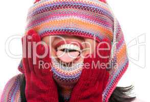 Playful Woman With Colorful Scarf Over Eyes Sticking Out Tong