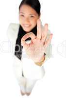 businesswoman showing OK sign