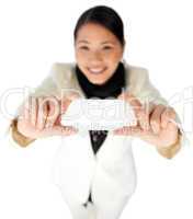 businesswoman showing a white card