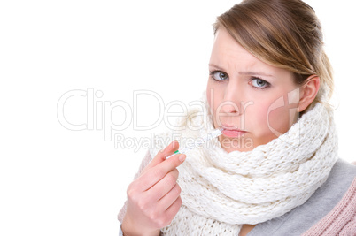 Woman with clinical thermometer