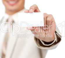 Businessman holding a white card