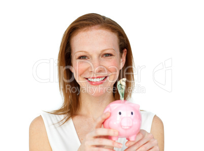 businesswoman saving money in a piggybank