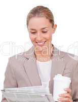 businesswoman with coffee and newspaper