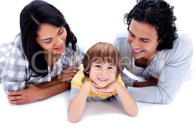 Happy family lying on the floor