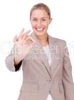 Positive businesswoman showing OK sign