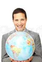 businessman holding a terrestrial globe