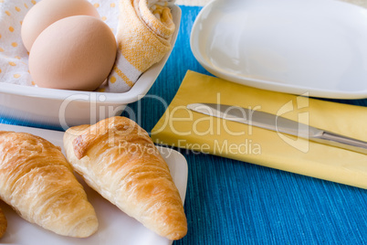 Croissant with blue background