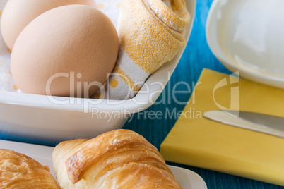 Croissant with blue background