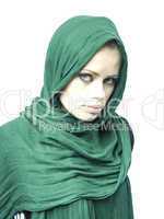 very beautiful woman in a green linen cape