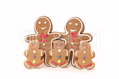 Five Gingerbread People Against a White Background