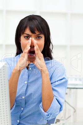 Anger businesswoman shouting