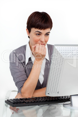 businesswoman sitting at her desk