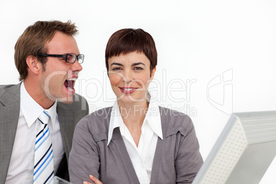 businessman shouting into his colleague's ear