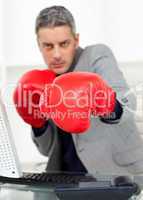 Businessman with boxing gloves