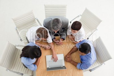 Concentrated business people using a laptop Concentrated business people using a laptop