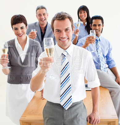 International business people toasting with Champagne