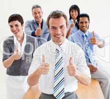 business people with thumbs up