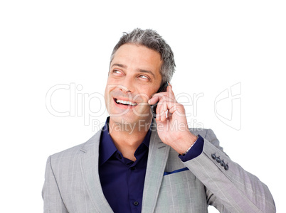 Businessman on phone looking up