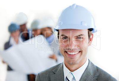 Smiling arhitect with a hardhat
