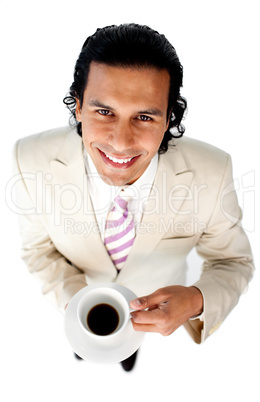 Smiling ethnic businessman drinking a coffee