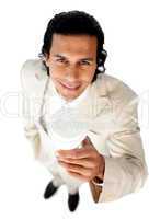 Charming ethnic businessman holding a drinking cup