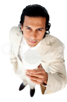 Attractive ethnic businessman holding a drinking cup