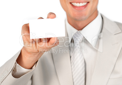 Close-up of a businessman holding a white card