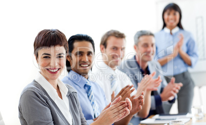 Multi-ethnic business people clapping a good presentation