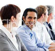 International business people sitting in a row