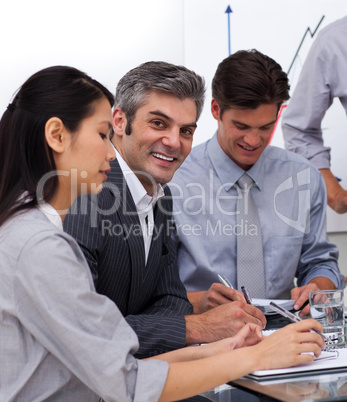 Multi-ethnic business co-workers in a meeting