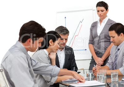 Serious business group at a presentation