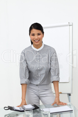Portrait of a glowing asian businesswoman at a presentation