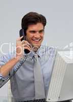 Smiling businessman on phone