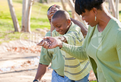 Happy African American Man, Woman and Child