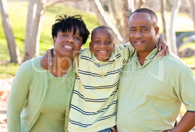 Happy African American Man, Woman and Child