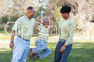 Playful African American Man, Woman and Child