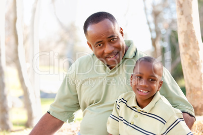 Attractive African American Man and Child Having Fun