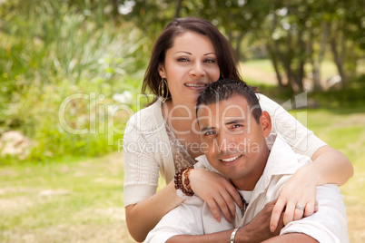 Attractive Hispanic Couple in the Park