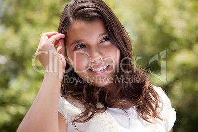 Cute Happy Hispanic Girl in the Park