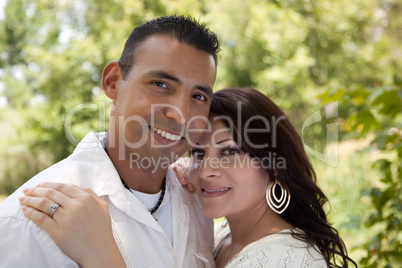 Attractive Hispanic Couple in the Park